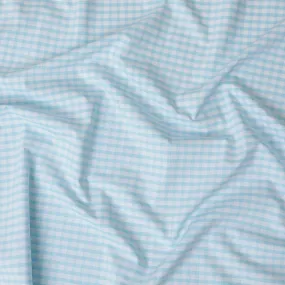 White Premium 100% cotton shirting fabric with turquoise blue print in checks design-D16843