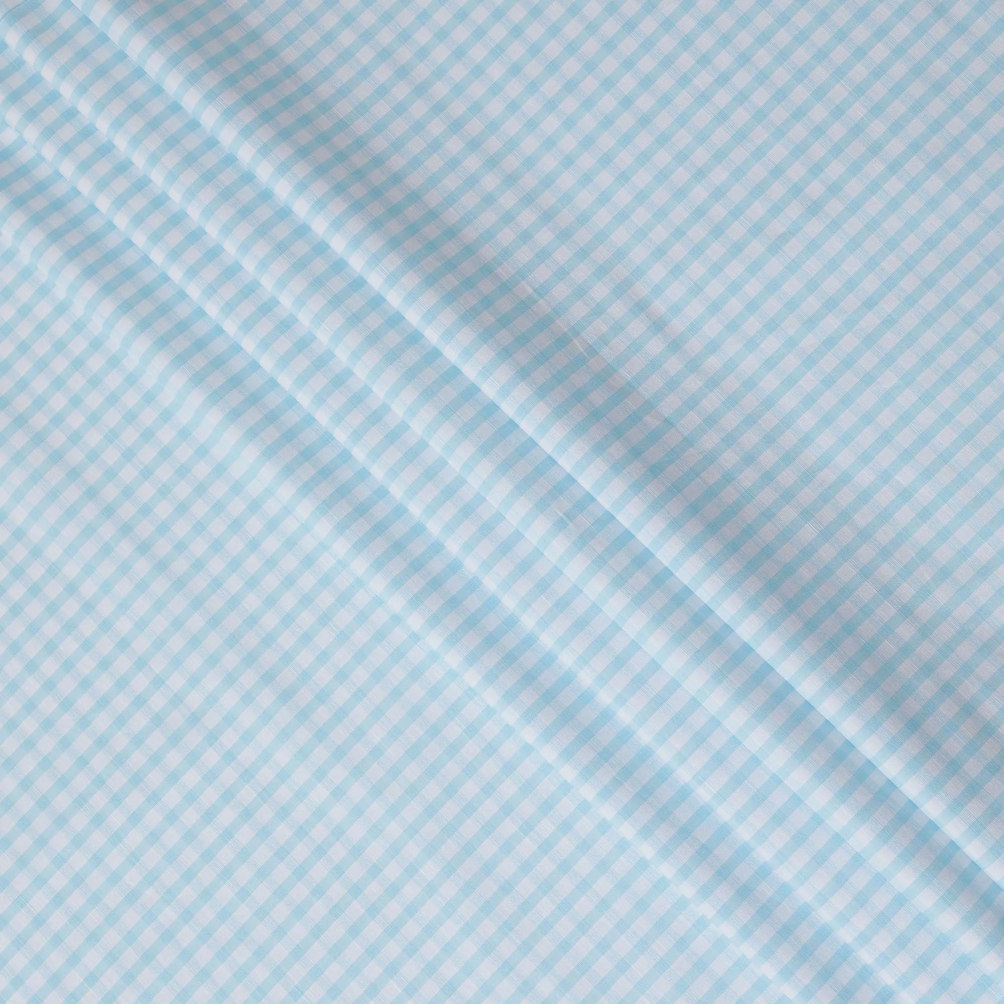 White Premium 100% cotton shirting fabric with turquoise blue print in checks design-D16843